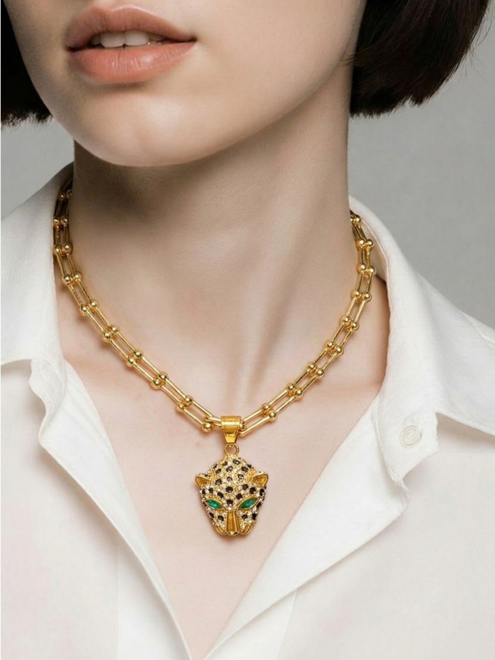 Elegant Gold Necklace with Panther Pendant